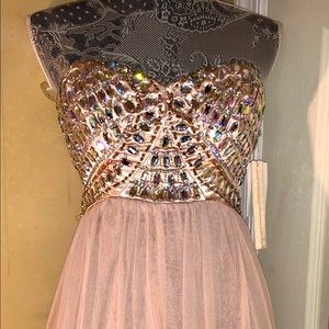 Formal nude dress with rhinestone bodice size 3